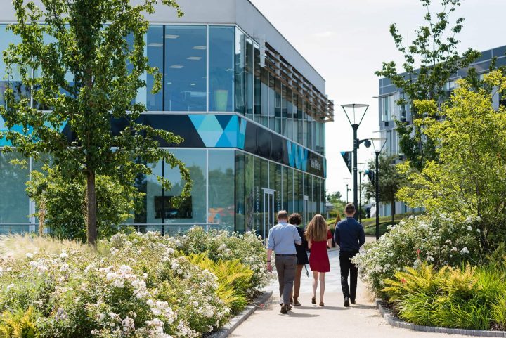 people walking in group towards the winnersh building